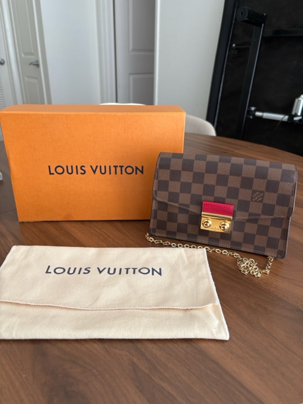 Louis Vuitton Brown Checkered Crossbody Bag with Red Accent